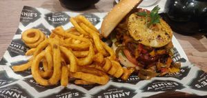 Vegan Carribbean burger with curly fries at Annie's Burger Shack in Nottingham