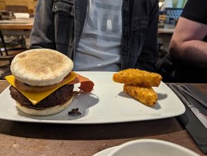 Vegan breakfast burger and hash browns at Annie's Burger Shack in Nottingham