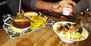 Vegan burger and salad at Annie's Burger Shack in Nottingham
