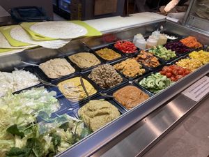 Price of one roll is €7,90. Choices are: vegan kebab, shoarma or falafel. Standard topping is lettuce and then you can choose three more additional toppings and a sauce    at Gustav Grün in Oldenburg