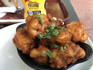 Cauliflower un-wings in a “honey” sriracha  marinade   at Flying Star Cafe in Albuquerque