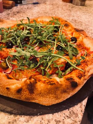 Pizza freshly made in-house in our tiny kitchen at The Sound Lounge in Sutton