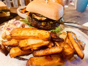 Mushroom Burger with Rocket Pesto, Twice-Baked Hand-cut Chips & Home-made Coleslaw at The Sound Lounge in Sutton