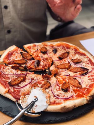 Freshly baked artisan pizza at The Sound Lounge in Sutton