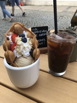 Bubble waffle with toffee ice cream and whipped cream ❤️ at Cafe Loumee in Fuessen