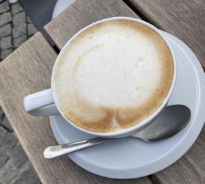Cappuccino with oat milk  at Cafe Loumee in Fuessen