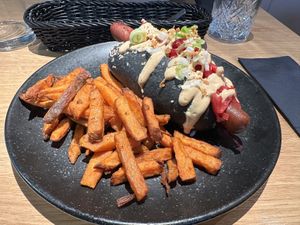 Daily lunch - vegan hot dog and sweet potato fries 🍟   at Green One BTC in Ljubljana