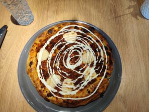 Pizza Ragu (meat sauce) with cashew cheese. at Green One BTC in Ljubljana