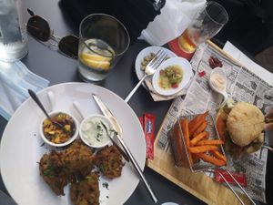 Vegan burger, sweet patatoe fries and indian dish (veggies) with mango chutney 😍 at Phoenix Belgian Vegg in Malaga