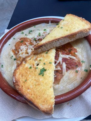 Yummie homemade Lasagne with toast. at Phoenix Belgian Vegg in Malaga