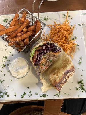 Smoky Sausage wrap sweet potato fries!   at Phoenix Belgian Vegg in Malaga