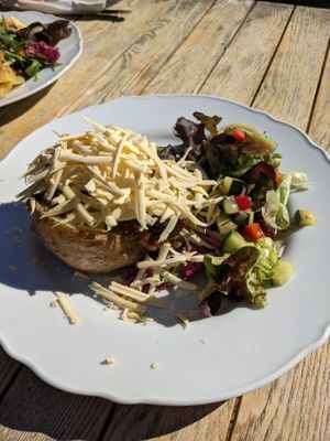 Baked Potato with haggis and cheese at The Midge Bite Cafe in Achnasheen
