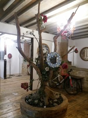 Mirror  art work at the back of the cafe. at Cafe Under the Spire in Gateshead