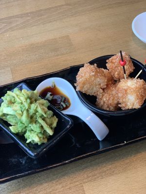 Crispy sticky rice cubes with avocado and soy sauce (favorite ) at ZIZO in Zandvoort