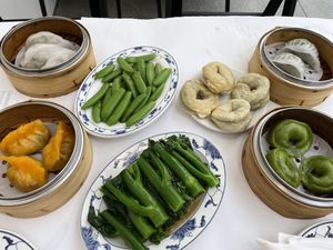 Dumplings, scallion pancakes, greens and snap peas.  All outstanding!   at Yank Sing in San Francisco