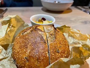 Leek Bread & Marigold "butter" at Oyster Oyster in Washington