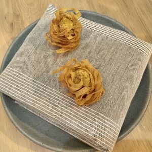 Celeriac, smoked tofu, garlic scapes   at Oyster Oyster in Washington