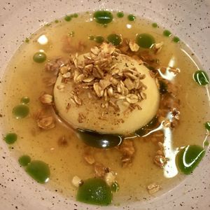 Apple cider, black walnut granola, fig leaf  at Oyster Oyster in Washington