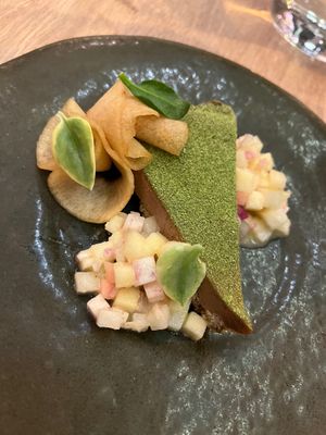 Savory pecan tart with apples, radish, and tarragon.  at Oyster Oyster in Washington