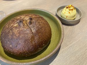 Sweet garleek bread with marigold butter: so good at Oyster Oyster in Washington