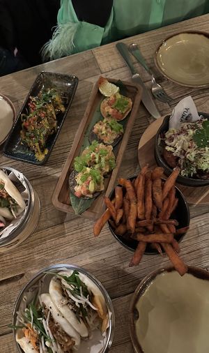 miso aubergine, sweet potato fries, KFCauliflower, Bao Schawarma  at Yuma in Zurich