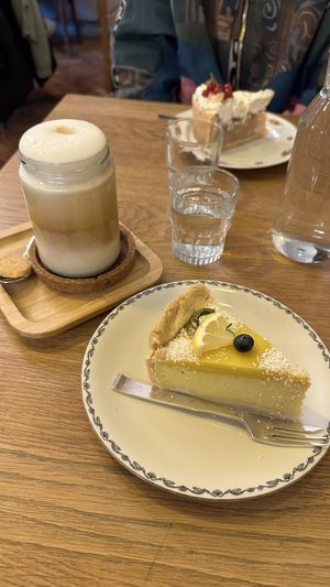 2 vegan cakes of the day, cookie next to coffee probably not vegan, next time I will ask for one without a cookie  at Kafi Franz in St Gallen