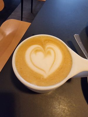 Large oatmilk latte at Espresso Embassy in Budapest