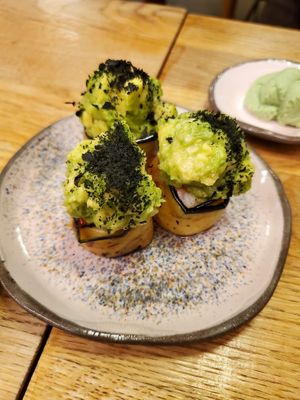 Wrapped in eggplant, topped with avo at Youmiko Sushi - Narbutta in Warsaw