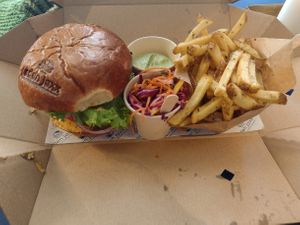 My menu: a classic hamburger, some green thing I forgot the name of, a bit of salad and well made french fries. at Eden Jaxx in Copenhagen