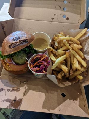 Burger, coleslaw, burger sauce and fries.

Coleslow was bad, the rest was great! at Eden Jaxx in Copenhagen