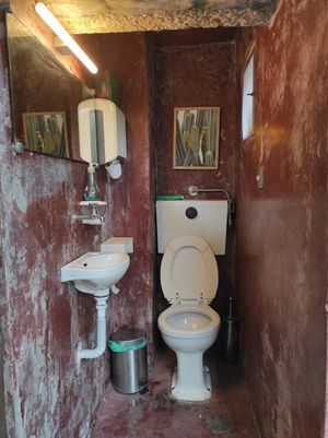 Toilet outside at The Happy Nest in Porto