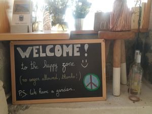 Sign at The Happy Nest in Porto