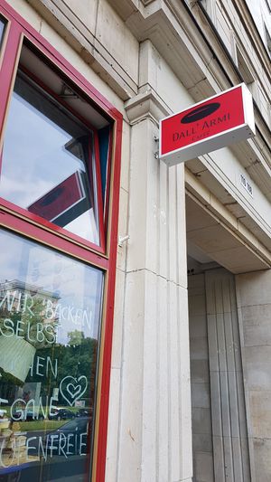 Sign says Dall'Armi Café at Vintage Pretty Café Deli in Berlin
