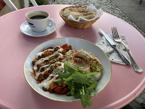 Vegan shakshuka with hummus and pita bread   at Vintage Pretty Café Deli in Berlin