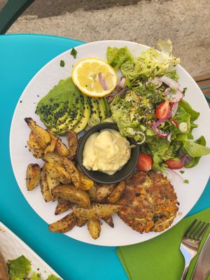 Vegetable steak with potatoes, mayonnaise, and salad at 1001 Saveurs Sauvages in Ajaccio
