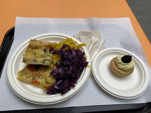 Dinner before closing time (salted tart with veggies, two types of cabbage salads), sweet muffin  at Jaa Nu' Rosticceria Vegana in Genoa