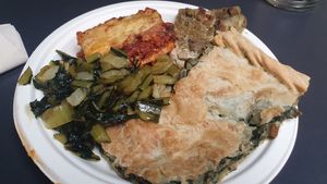 Green vegetable, spinach pie, two different types of lasagne at Jaa Nu' Rosticceria Vegana in Genoa