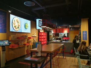 Tables and front desk at Crust Pizza Lab - Maybe closed in Malmo