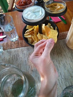 Vegan nacho (slovenian Sančo), white garlic sauce and salsa with chips at De Poncho in Ptuj