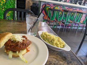 The tunnel burger and potato salad. at Vegan Hood in New York City