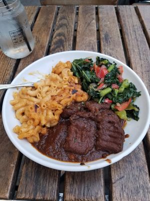 Oxtail with two sides....amazing! at Vegan Hood in New York City