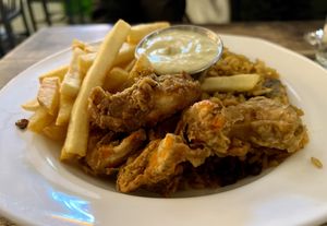 Bed stuy fry shrimp with fries and rice  at Vegan Hood in New York City