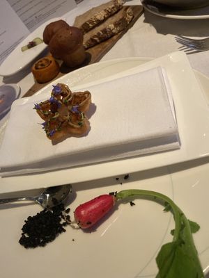 Green apple ravioli, waffle and girolles, breakfast radish at Pied a Terre in London