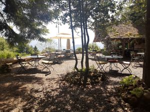Outdoor seating at Stiftung Felsentor Café  in Weggis