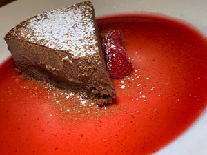 Dark Chocolate Mousse Cake: Belgian Dark Chocolate Cake w/ Dark Chocolate Mousse, Raspberries, Raspberry Sauce (Grand Rapids Vegan Chef Challenge 9/25) at The Friesian in Grand Rapids