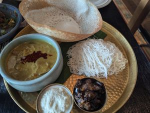 Aubergine Kari, coconut sambol, brinjal moju, hopper and string hoppers at Hoppers - King's Cross  in North London