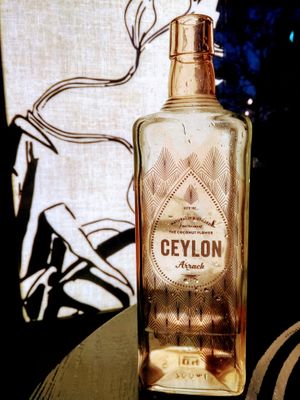 Water served in Arrack bottle  at Hoppers - King's Cross  in North London