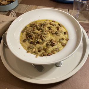 Beans cream with curcuma and pumpkin seeds at UNO Caffé Olistico in Bologna