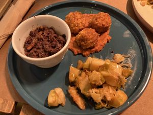 Mixed plate with meatballs at UNO Caffé Olistico in Bologna
