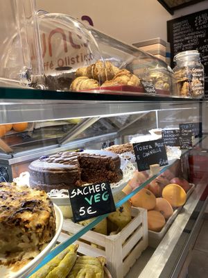 Vegan sacher, vegan apple pie, vegan buckwheat cake with blueberry jam at UNO Caffé Olistico in Bologna